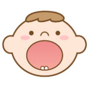 下の歯が2本生えている子どもの画像